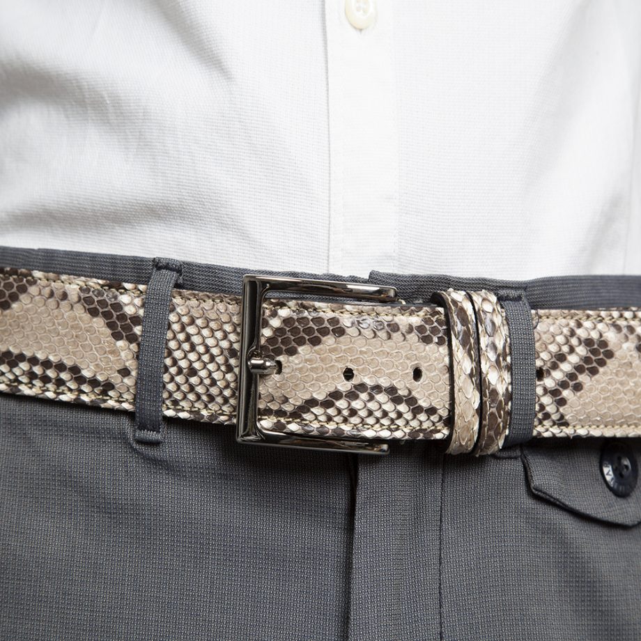 Brown python leather belt with silver-colored metal buckle. Belt made by Italian artisans with top quality vegetable tanned leather.