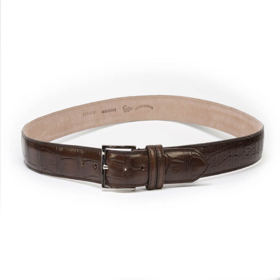 Crocodile leather belt with silver-colored palladium metal buckle. Belt handmade by artisans with top quality vegetable tanned leather.