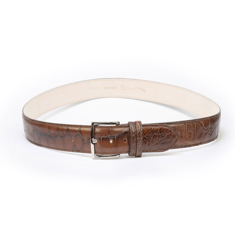 Crocodile leather belt with silver-colored palladium metal Brown. Belt handmade by artisans with top quality vegetable tanned leather.